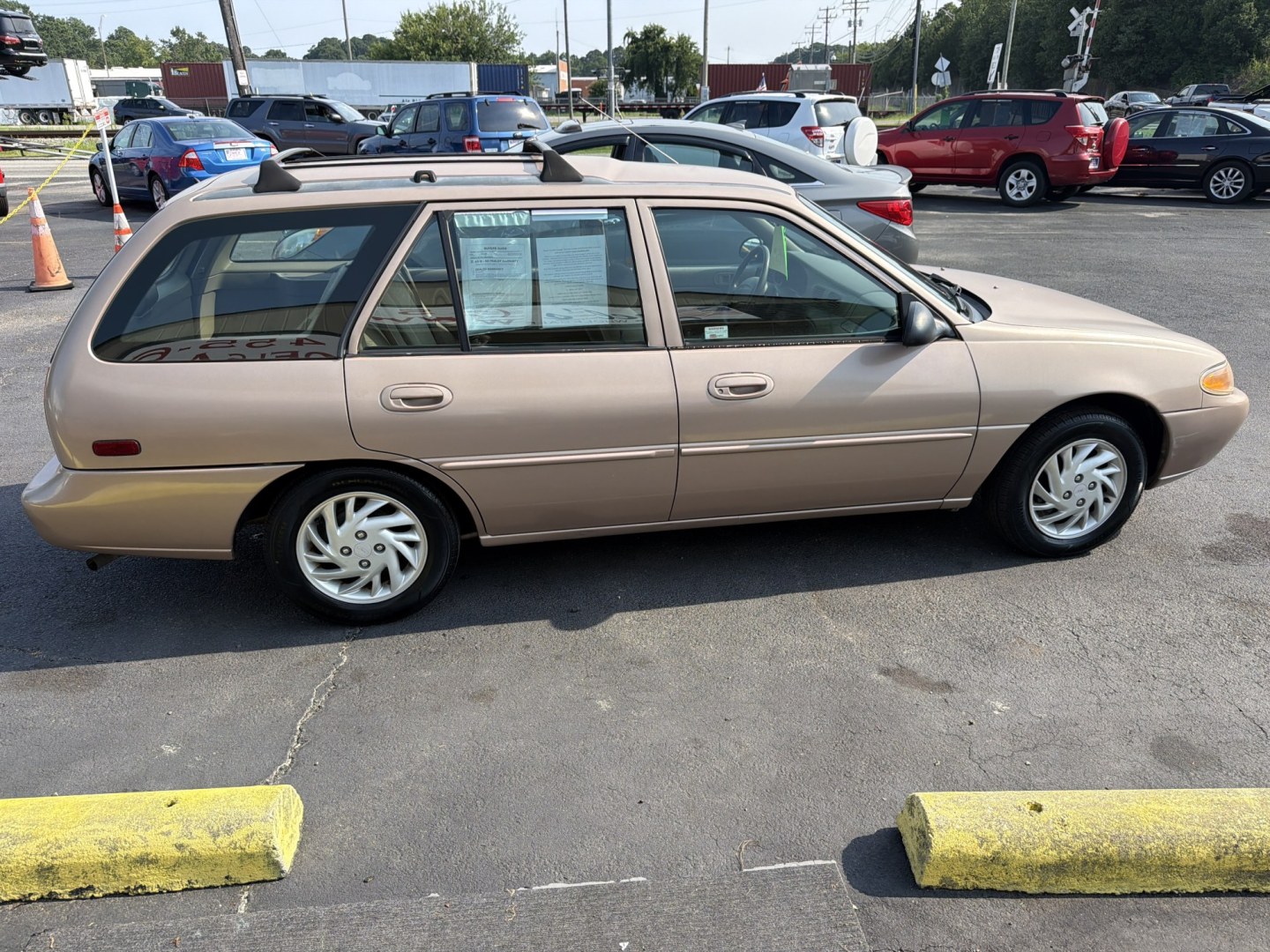 1999 BROWN Ford Escort Wagon SE (3FAFP15P8XR) with an 2.0L L4 SOHC 8V engine, Manual 5 Speed transmission, located at 5700 Curlew Drive, Norfolk, VA, 23502, (757) 455-6330, 36.841885, -76.209412- Photo#3