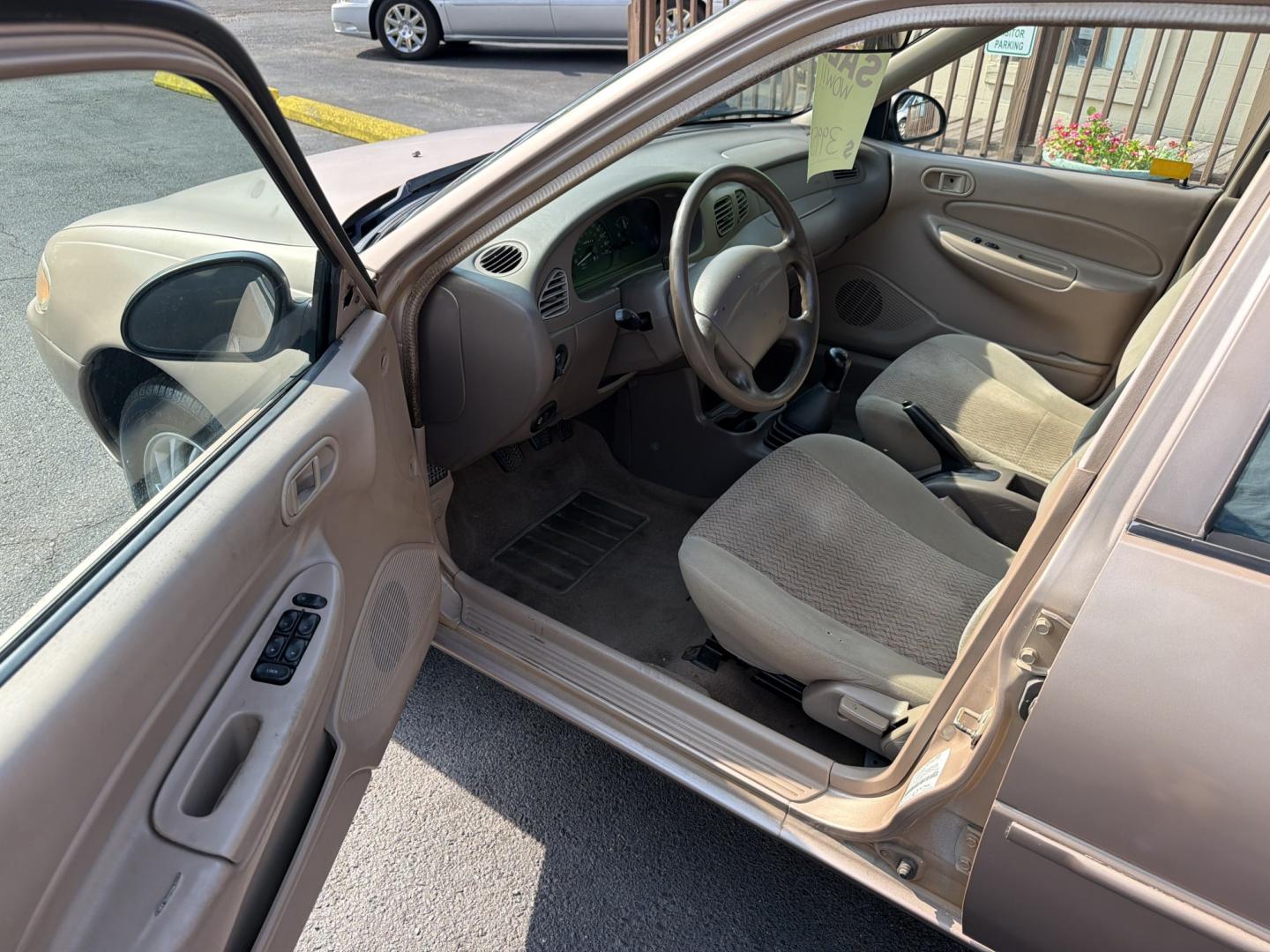 1999 BROWN Ford Escort Wagon SE (3FAFP15P8XR) with an 2.0L L4 SOHC 8V engine, Manual 5 Speed transmission, located at 5700 Curlew Drive, Norfolk, VA, 23502, (757) 455-6330, 36.841885, -76.209412- Photo#5