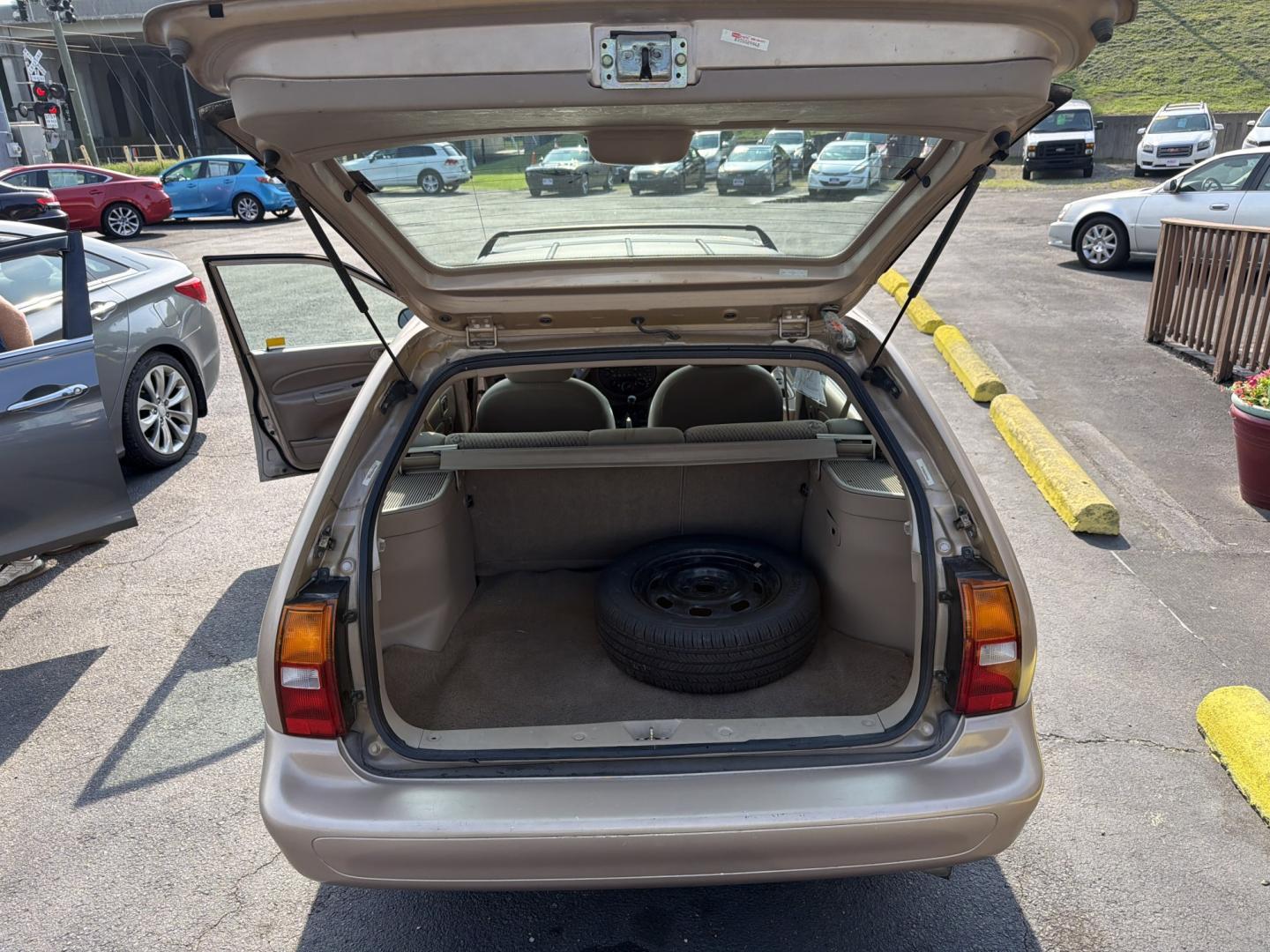 1999 BROWN Ford Escort Wagon SE (3FAFP15P8XR) with an 2.0L L4 SOHC 8V engine, Manual 5 Speed transmission, located at 5700 Curlew Drive, Norfolk, VA, 23502, (757) 455-6330, 36.841885, -76.209412- Photo#9