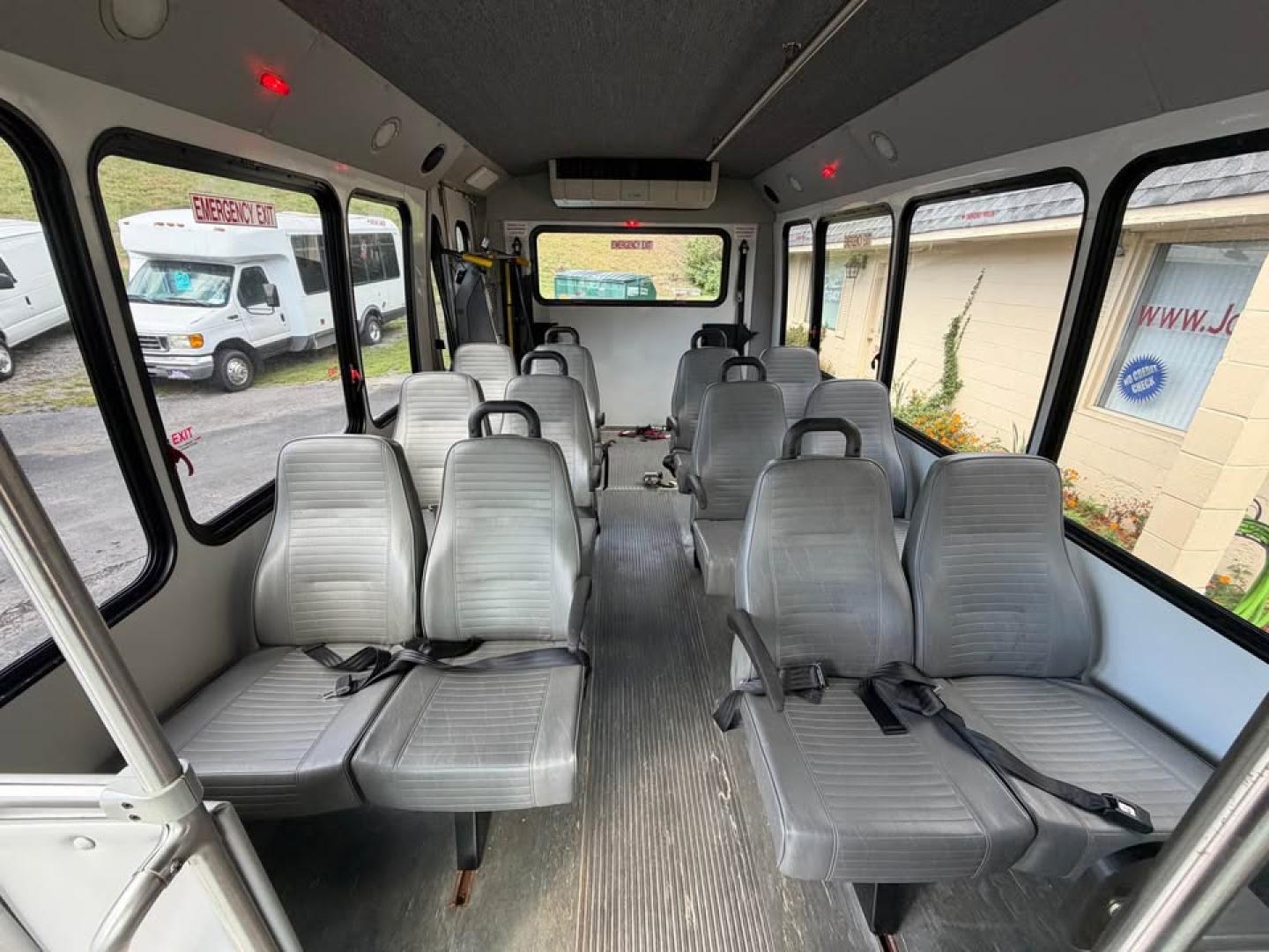 2012 WHITE /Gray Ford Econoline E350 (1FDEE3FS8CD) with an 6.8L V10 SOHC 20V engine, Automatic transmission, located at 5700 Curlew Drive, Norfolk, VA, 23502, (757) 455-6330, 36.841885, -76.209412 - CASH DEAL NO IN HOUSE FINANCING -2012 Ford Econoline E350 Cutaway Bus -20K original miles -Wheel chair lift -12 Passengers, 1 Driver+ Space for wheel chair, No cdl required -Excellent condition everything works as should -V10 Gas -Virginia Dealer $250 Processing Fee INCLUDED IN PRICE- Photo#9