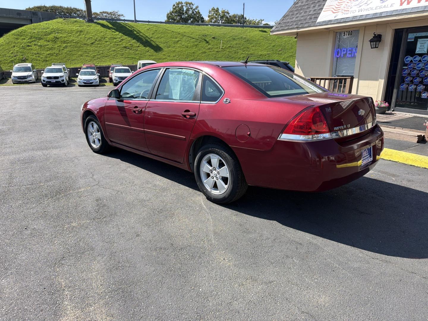 2007 red Chevrolet Impala LT1 3.5L (2G1WT58K079) with an 3.5L V6 OHV 12V FFV engine, 4A OD transmission, located at 5700 Curlew Drive, Norfolk, VA, 23502, (757) 455-6330, 36.841885, -76.209412- Photo#1
