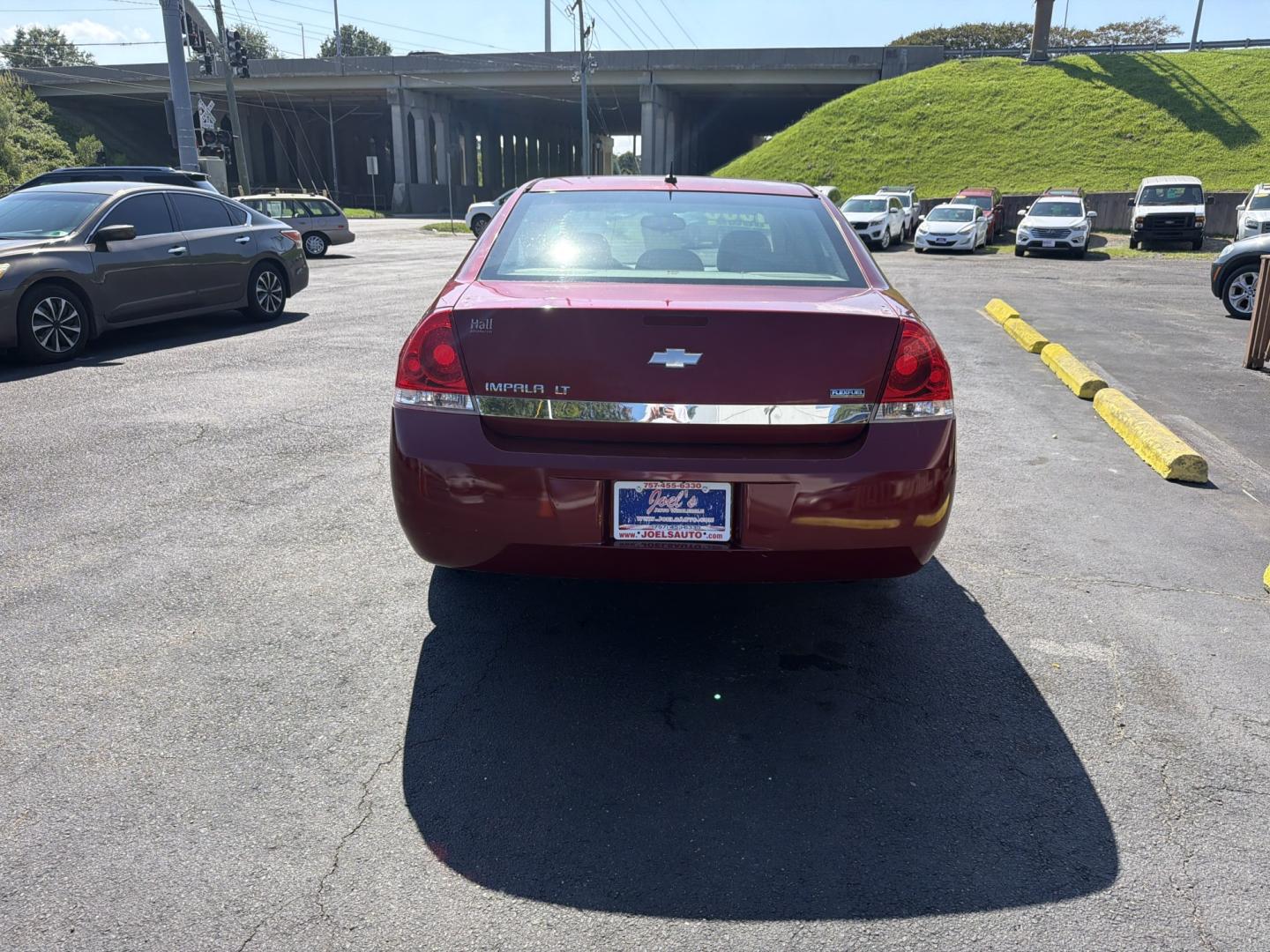 2007 red Chevrolet Impala LT1 3.5L (2G1WT58K079) with an 3.5L V6 OHV 12V FFV engine, 4A OD transmission, located at 5700 Curlew Drive, Norfolk, VA, 23502, (757) 455-6330, 36.841885, -76.209412- Photo#2