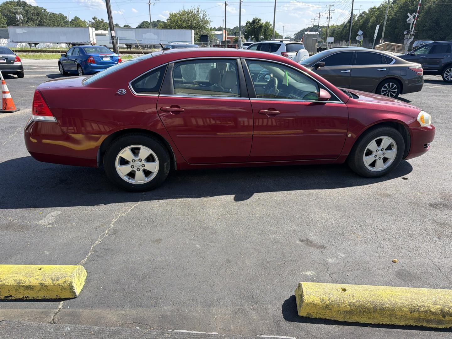 2007 red Chevrolet Impala LT1 3.5L (2G1WT58K079) with an 3.5L V6 OHV 12V FFV engine, 4A OD transmission, located at 5700 Curlew Drive, Norfolk, VA, 23502, (757) 455-6330, 36.841885, -76.209412- Photo#3