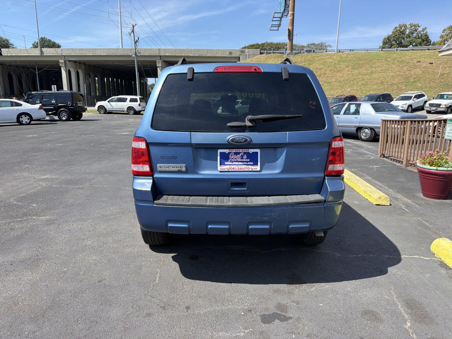 2010 Blue Ford Escape XLT FWD (1FMCU0D75AK) with an 2.5L L4 DOHC 16V engine, 6A transmission, located at 5700 Curlew Drive, Norfolk, VA, 23502, (757) 455-6330, 36.841885, -76.209412- Photo#2