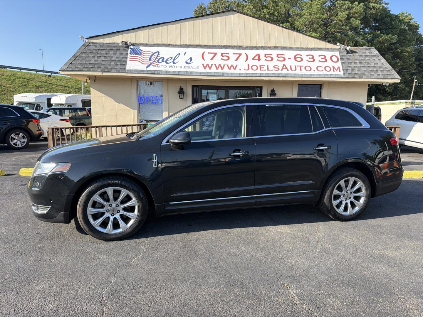 2013 Black Lincoln MKT 3.5L with EcoBoost AWD (2LMHJ5ATXDB) with an 3.5L V6 DOHC 24V TURBO engine, 6-Speed Automatic transmission, located at 5700 Curlew Dr., Norfolk, VA, 23502, (703) 554-4373, 36.841885, -76.209412- Photo#0