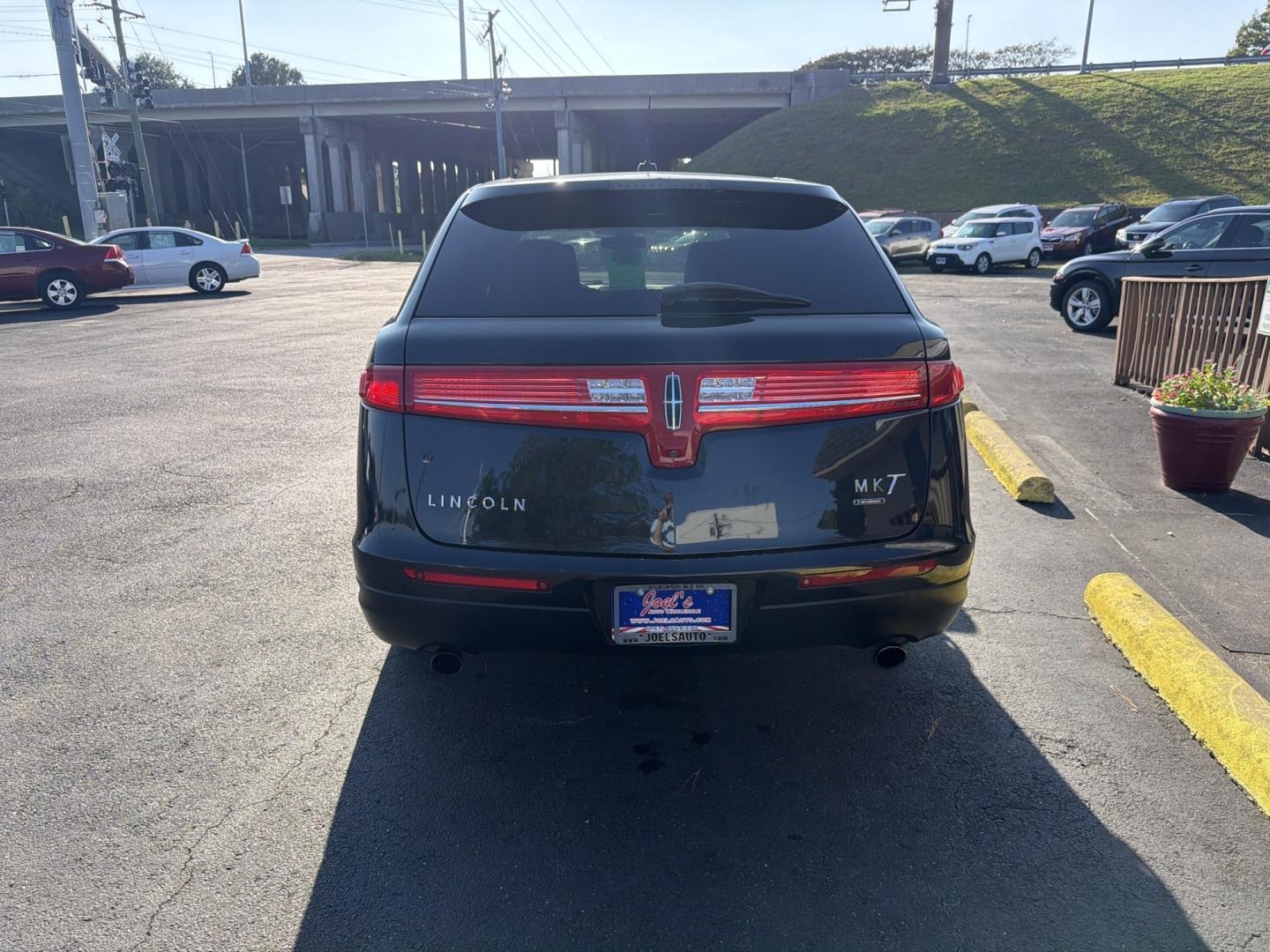 2013 Black Lincoln MKT 3.5L with EcoBoost AWD (2LMHJ5ATXDB) with an 3.5L V6 DOHC 24V TURBO engine, 6-Speed Automatic transmission, located at 5700 Curlew Dr., Norfolk, VA, 23502, (703) 554-4373, 36.841885, -76.209412- Photo#2