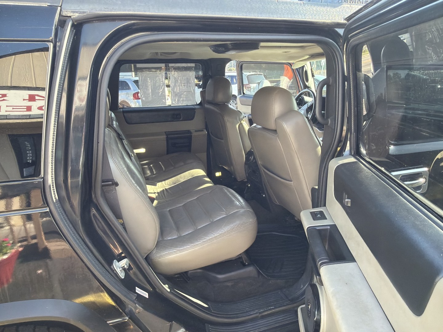 2005 Black Hummer H2 SUV (5GRGN23UX5H) with an 6.0L V8 OHV 16V engine, 4A OD transmission, located at 5700 Curlew Dr., Norfolk, VA, 23502, (703) 554-4373, 36.841885, -76.209412- Photo#7