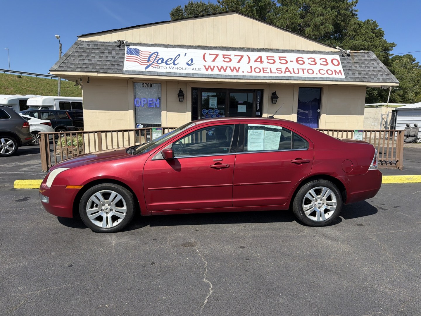 2009 red Ford Fusion V6 SEL (3FAHP08199R) with an 3.0L V6 DOHC 24V engine, 6-Speed Automatic transmission, located at 5700 Curlew Drive, Norfolk, VA, 23502, (757) 455-6330, 36.841885, -76.209412- Photo#0