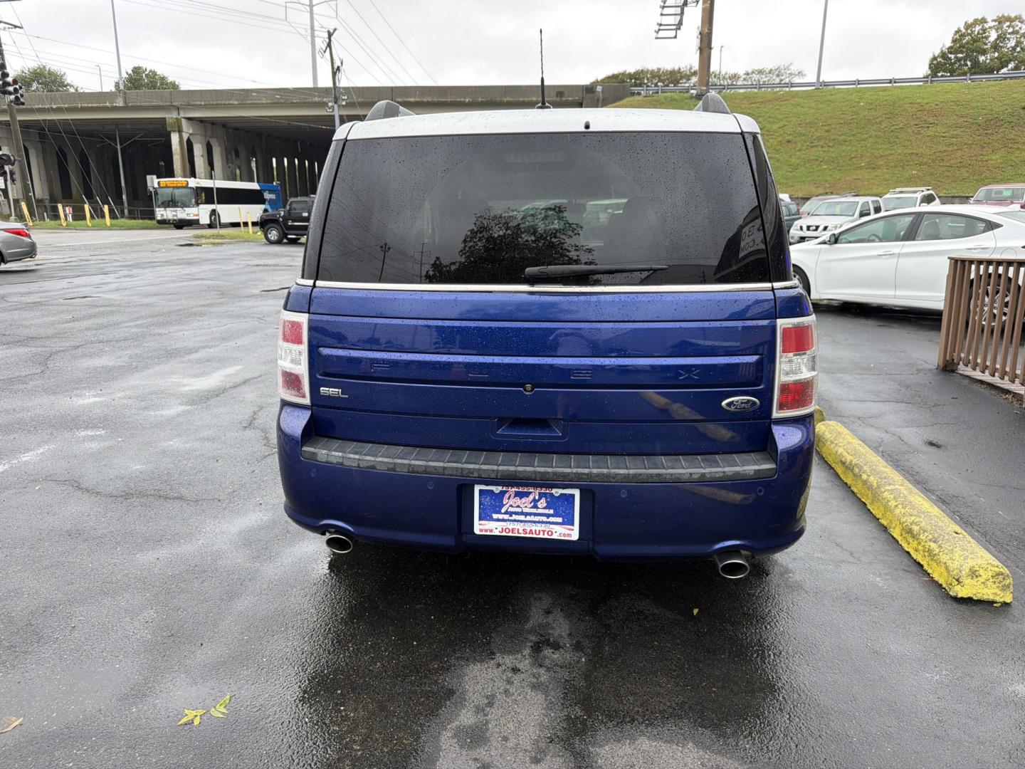 2014 Blue Ford Flex SEL FWD (2FMGK5C83EB) with an 3.5L V6 DOHC 24V engine, 6-Speed Automatic Overdrive transmission, located at 5700 Curlew Drive, Norfolk, VA, 23502, (757) 455-6330, 36.841885, -76.209412- Photo#2