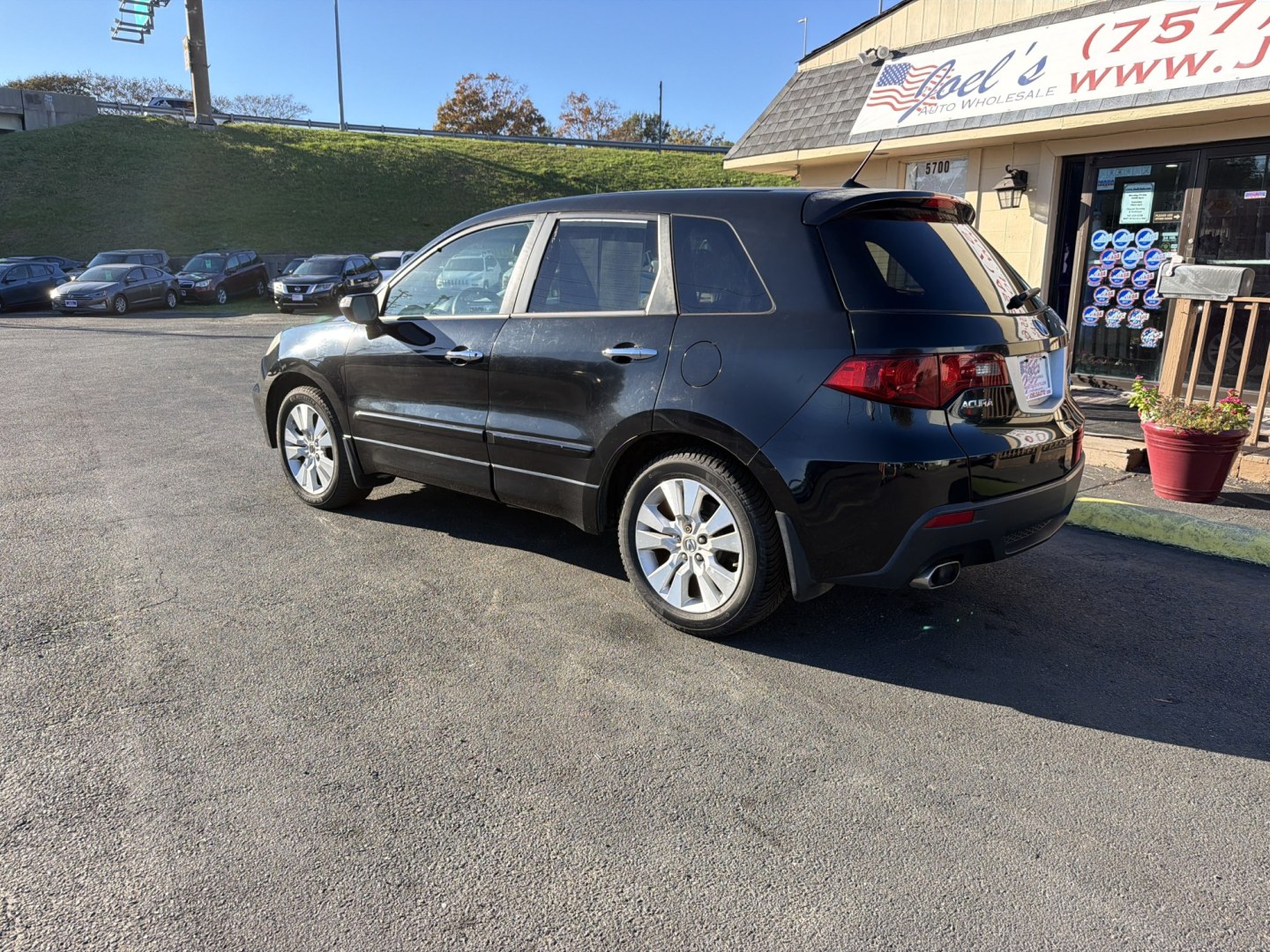 2011 Black Acura RDX 5-Spd AT SH-AWD with Technology Package (5J8TB1H55BA) with an 2.3L L4 DOHC 16V engine, 5A transmission, located at 5700 Curlew Drive, Norfolk, VA, 23502, (757) 455-6330, 36.841885, -76.209412- Photo#1