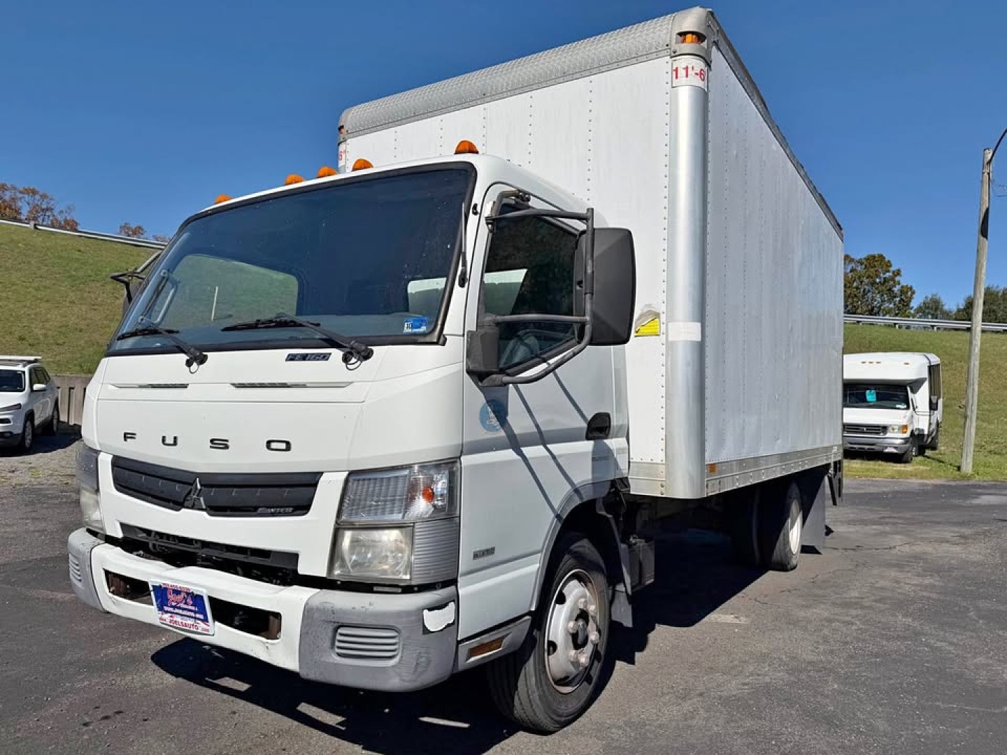 2012 WHITE /Blue Mitsubishi Fuso FEC72S (JL6BNG1AXCK) , Automatic transmission, located at 5700 Curlew Drive, Norfolk, VA, 23502, (757) 455-6330, 36.841885, -76.209412 - -2012 Mitsubishi Fuso Diesel -108k Miles -16ft box with lift gate -New state inspection -Ready to work again -Virginia dealer $250 processing fee included in price- Photo#0