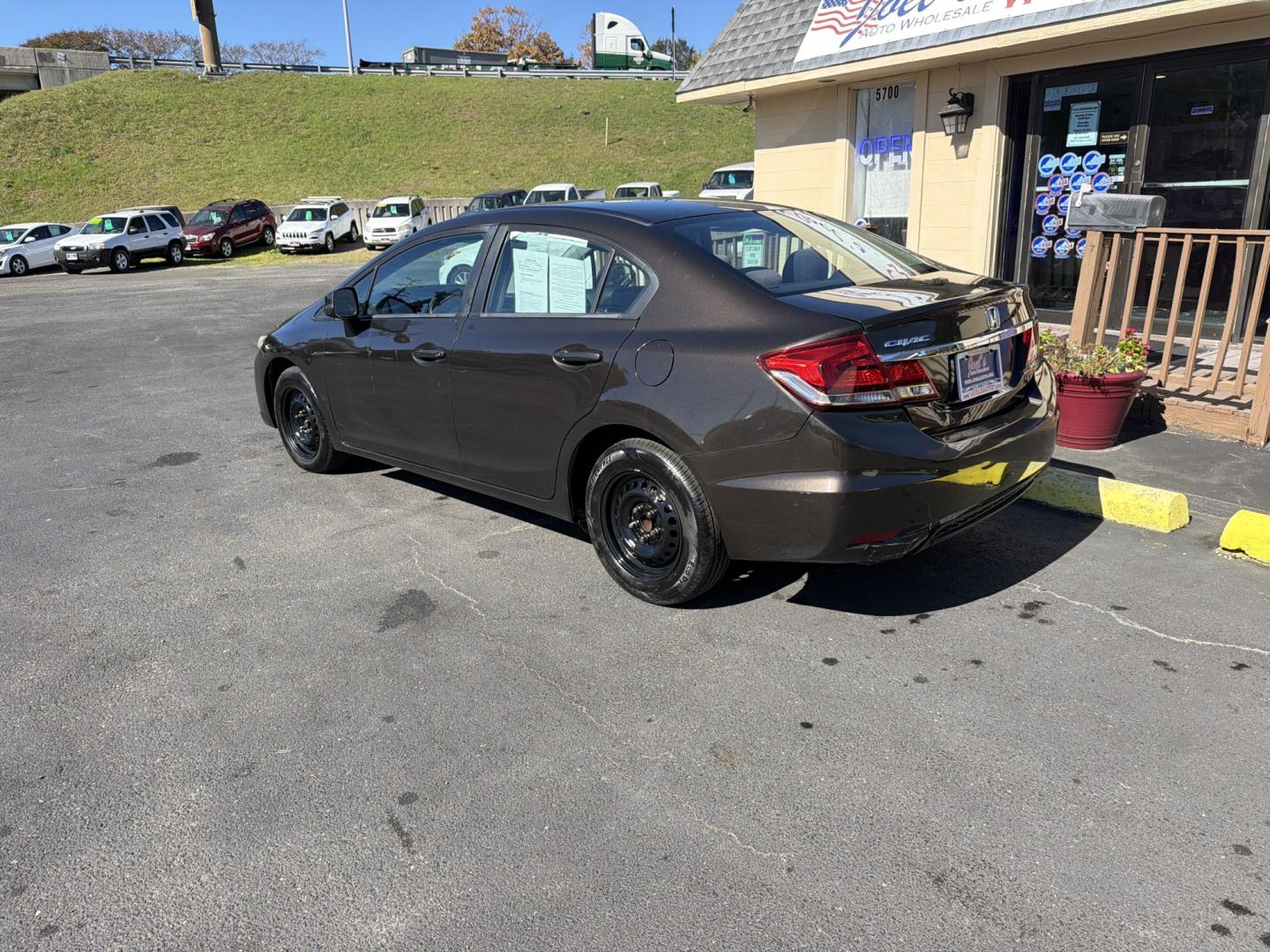 2013 Brown Honda Civic LX Sedan 5-Speed AT (2HGFB2F58DH) with an 1.8L L4 SOHC 16V engine, 5A transmission, located at 5700 Curlew Drive, Norfolk, VA, 23502, (757) 455-6330, 36.841885, -76.209412- Photo#1