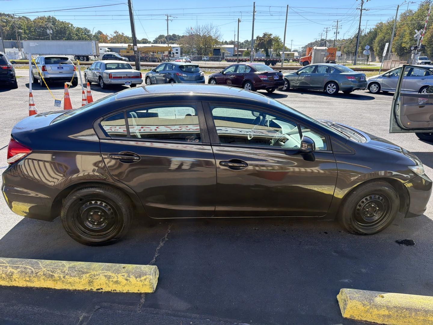 2013 Brown Honda Civic LX Sedan 5-Speed AT (2HGFB2F58DH) with an 1.8L L4 SOHC 16V engine, 5A transmission, located at 5700 Curlew Drive, Norfolk, VA, 23502, (757) 455-6330, 36.841885, -76.209412- Photo#3