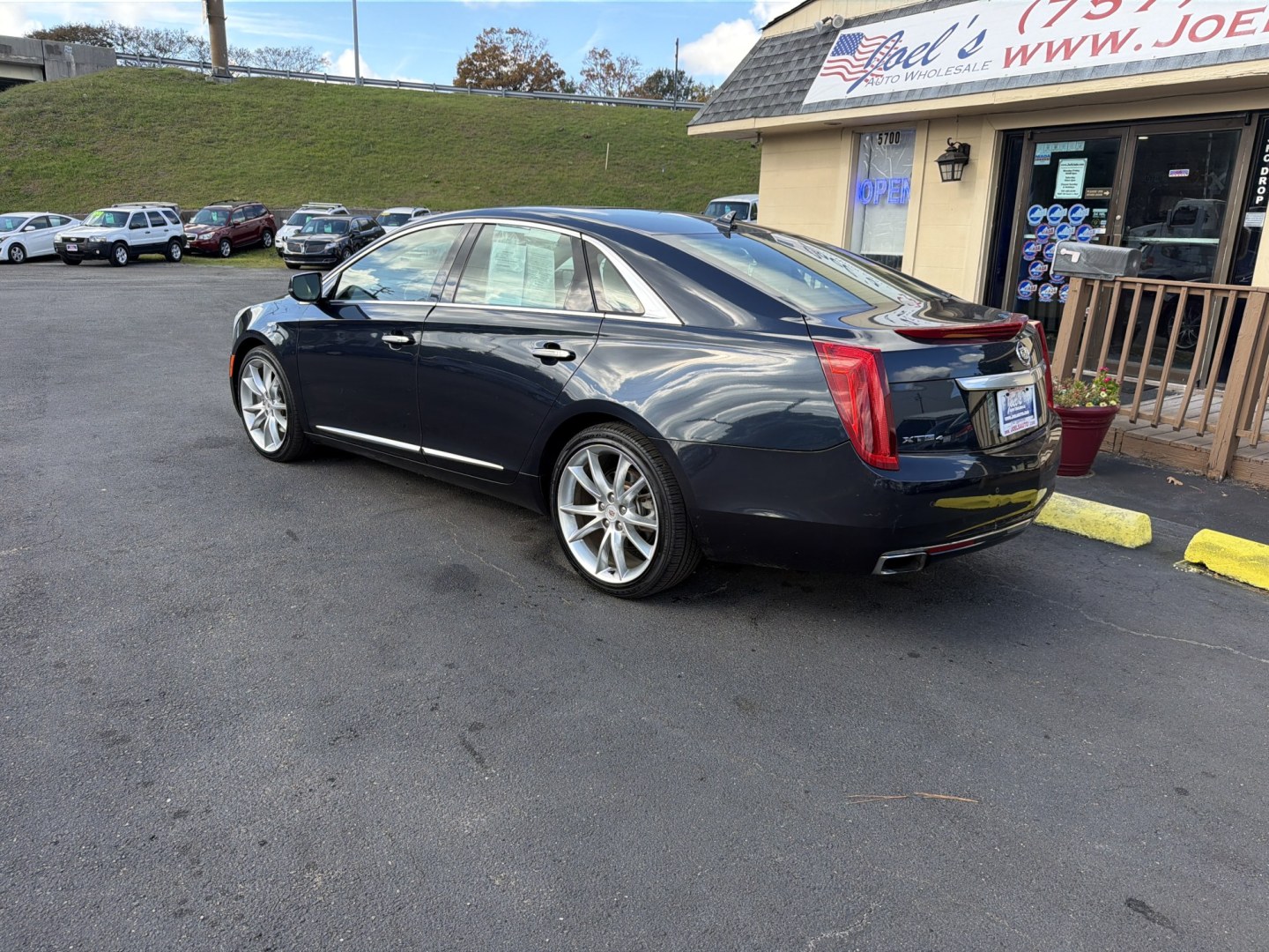 2014 Blue /Tan Cadillac XTS Premium AWD (2G61R5S31E9) with an 3.6L V6 DOHC 24V engine, 6-Speed Automatic transmission, located at 5700 Curlew Drive, Norfolk, VA, 23502, (757) 455-6330, 36.841885, -76.209412- Photo#1