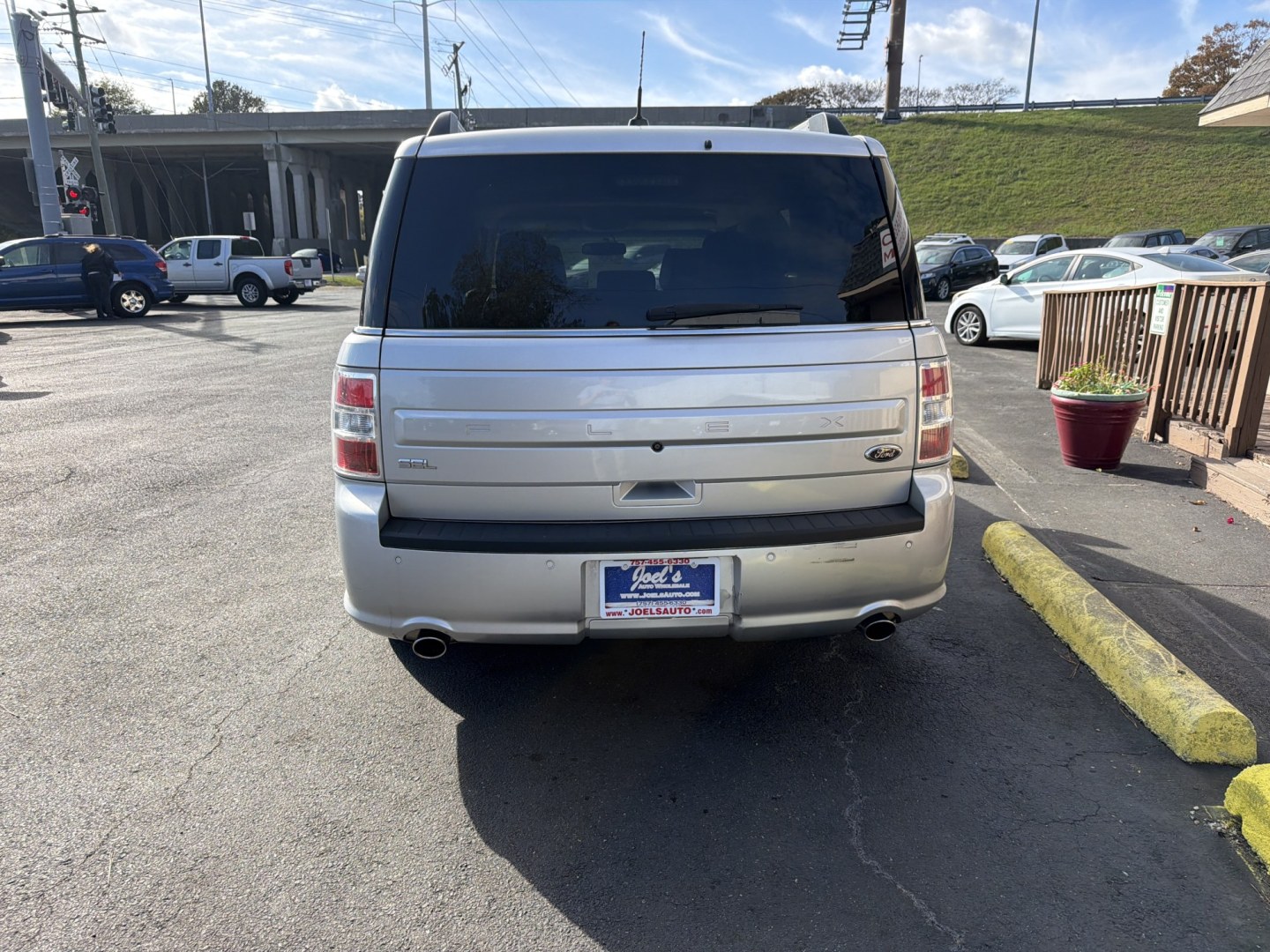 2014 Silver Ford Flex SEL FWD (2FMGK5C80EB) with an 3.5L V6 DOHC 24V engine, 6-Speed Automatic Overdrive transmission, located at 5700 Curlew Dr., Norfolk, VA, 23502, (703) 554-4373, 36.841885, -76.209412- Photo#2