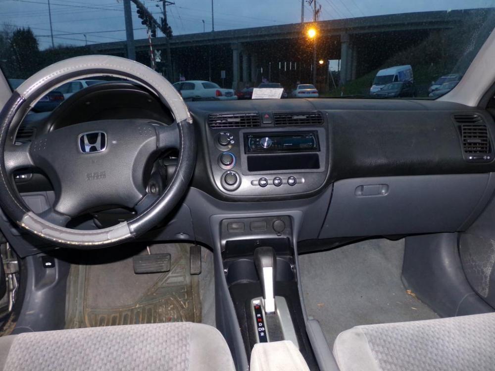 2005 Grey /Grey Honda Civic DX-VP (1HGES16345L) with an L4, 1.7L; SOHC engine, 4 Speed Automatic transmission, located at 5700 Curlew Drive, Norfolk, VA, 23502, (757) 455-6330, 36.841885, -76.209412 - *** NO CREDIT CHECK *** LOW DOWN PAYMENT *** - Photo #5